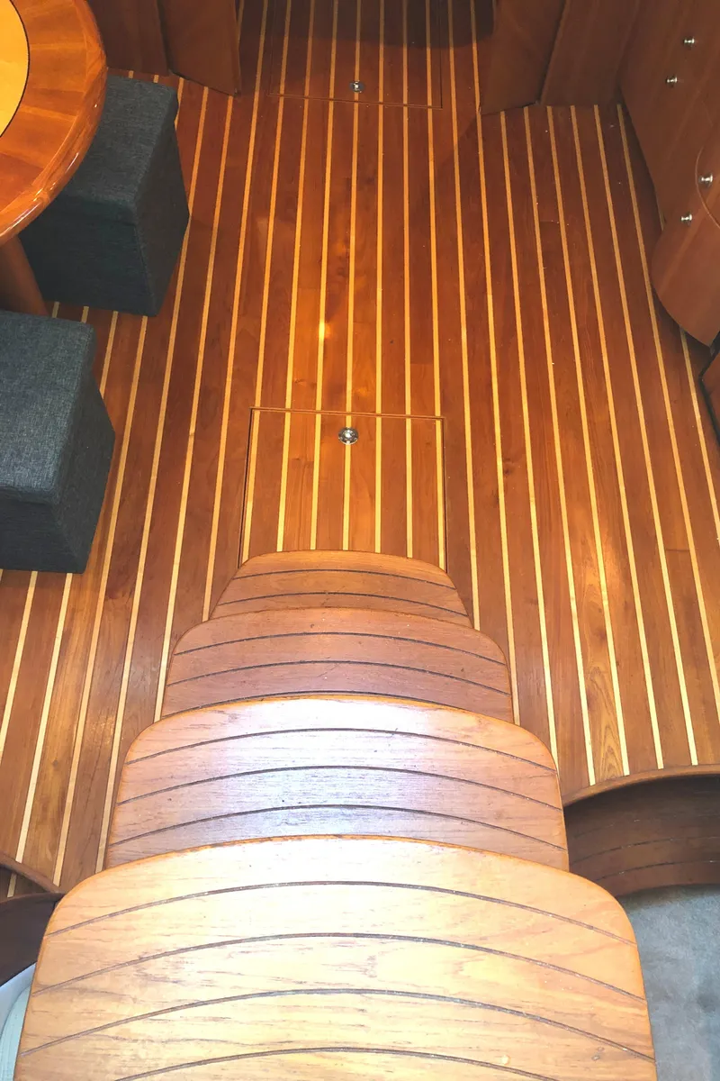 Slide: The Image of 2008 Tiara Yachts 3900 Sovran interior with polished wooden flooring and seating. - 45