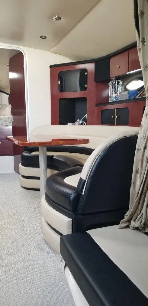 Slide: The Image of Interior of 2001 Wellcraft Martinique 3700 yacht with modern seating and cabinetry. - 27