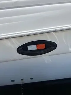 Slide: The Image of 2001 Wellcraft Martinique 3700 boat detail with oval light fixture. - 39