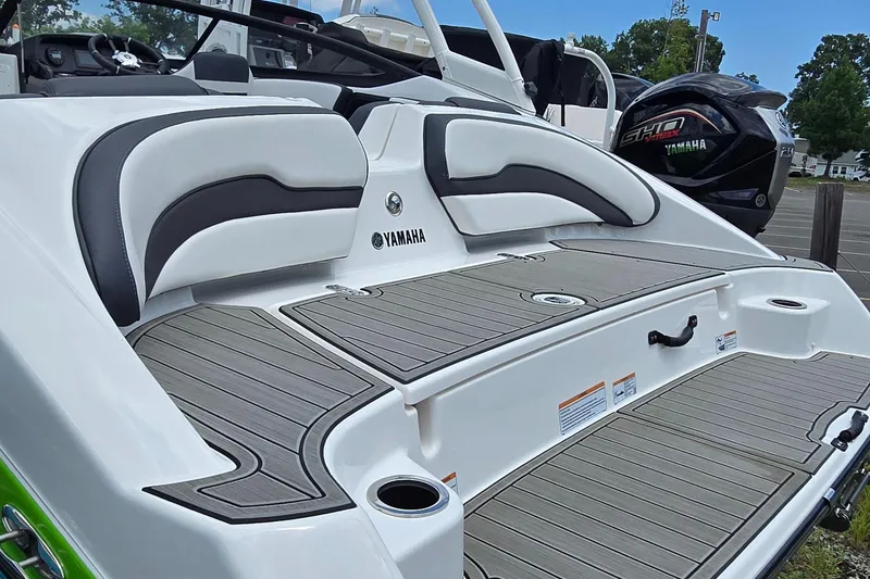 Slide: The Image of 2022 Yamaha AR195 boat with sleek seating and modern design. - 10