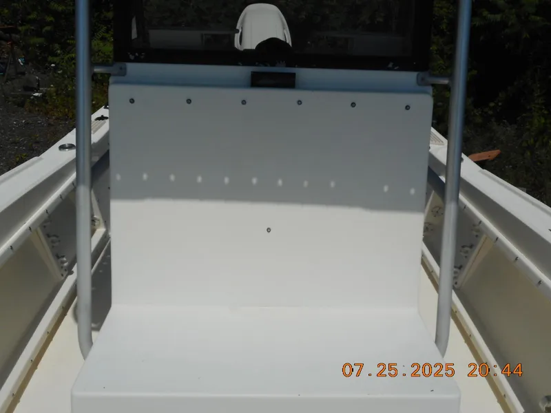 Slide: The Image of 1992 Mako 22 CC boat interior with console and seating, dated July 25, 2025. - 11