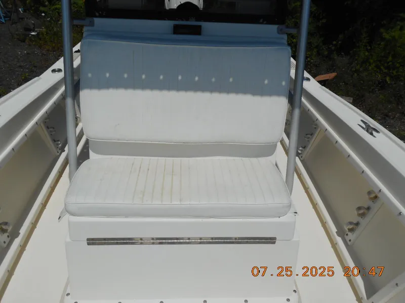 Slide: The Image of 1992 Mako 22 CC boat with white seating, photographed on July 25, 2025. - 14