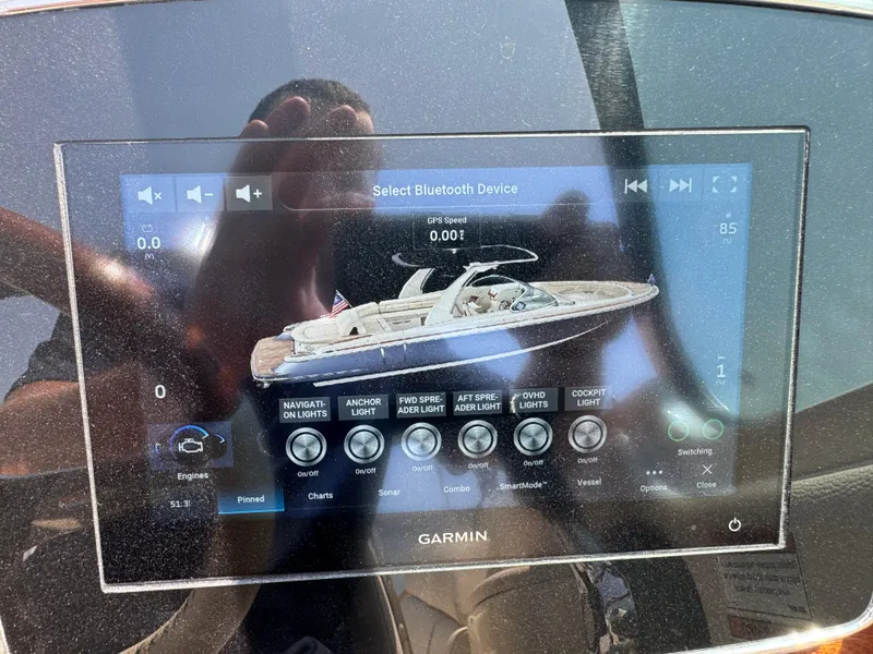 Slide: The Image of Garmin display on 2022 Chris-Craft Launch 28 GT boat, showing control interface. - 25
