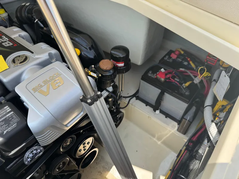 Slide: The Image of Engine compartment of 2022 Chris-Craft Launch 28 GT with Big Block V8 engine and battery setup. - 31