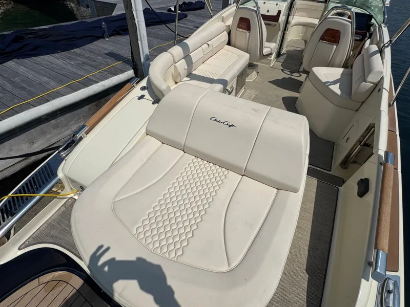 Slide: The Image of 2022 Chris-Craft Launch 28 GT boat interior with luxurious seating and elegant design. - 4