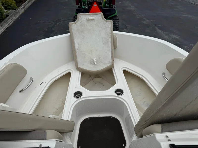 Slide: The Image of 2016 Bayliner VR5 Bowrider interior with seating and storage compartments. - 12