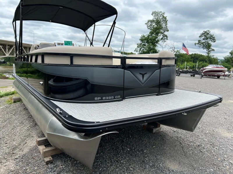 Slide: The Image of 2026 Tahoe Pontoon SPORT 85 2385 CRUISE on display, featuring sleek design and spacious deck. - 3