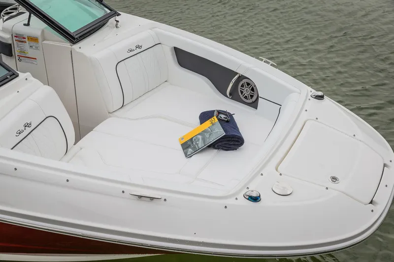 Slide: The Image of Manufacturer Provided Image: 2016 Sea Ray 220 Sundeck boat with white seating and accessories. - 3