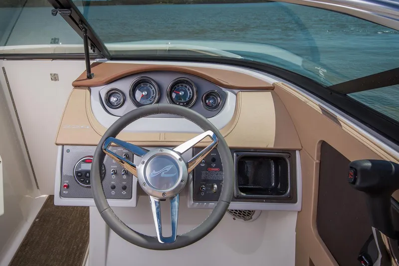 Slide: The Image of Interior of 2016 Sea Ray 220 Sundeck boat with compact toilet and storage. - 5