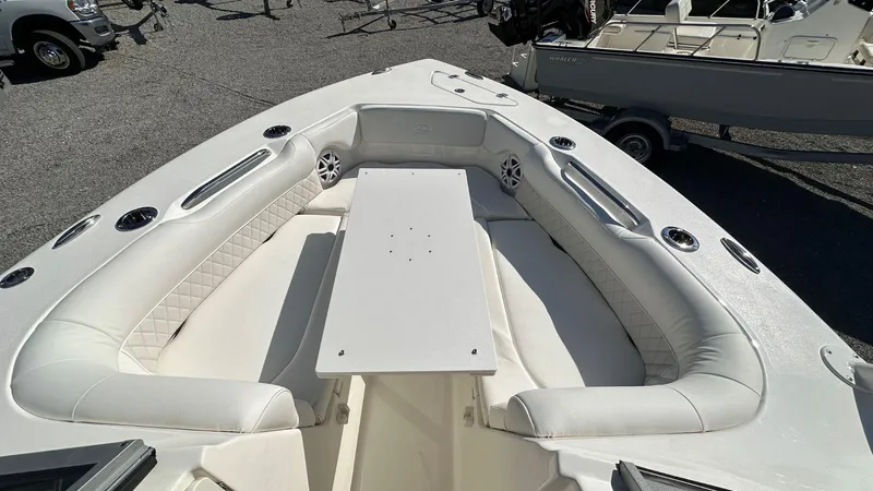 Slide: The Image of 2026 Key West 239 DFS boat interior with white seating and table. - 38