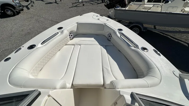 Slide: The Image of 2026 Key West 239 DFS boat interior with white cushioned seating. - 41