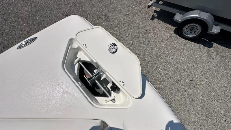 Slide: The Image of Open anchor compartment on 2026 Key West 239 DFS boat, showing anchor storage. - 43