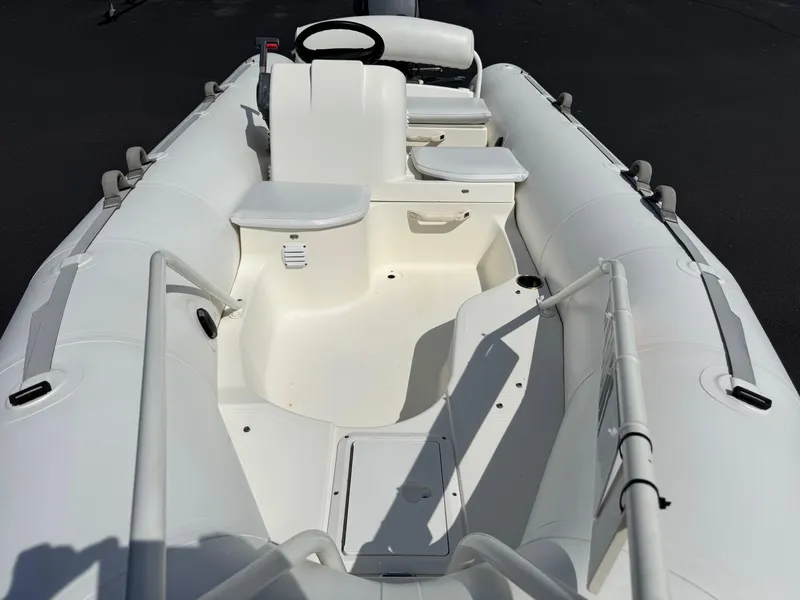 Slide: The Image of Inflatable Zodiac YL 420 DL boat, 2000 model, with white seating and steering console. - 5