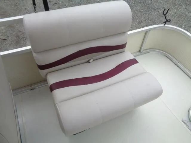 Slide: The Image of 2002 Lowe Suncruiser Trinidad 184 boat seat with white and maroon upholstery. - 19