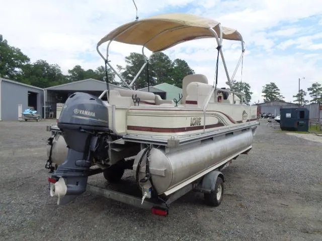 Slide: The Image of 2002 Lowe Suncruiser Trinidad 184 pontoon boat with Yamaha motor on trailer. - 6