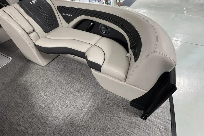 Slide: The Image of 2026 Barletta Corsa boat interior with luxurious beige and black seating. - 19
