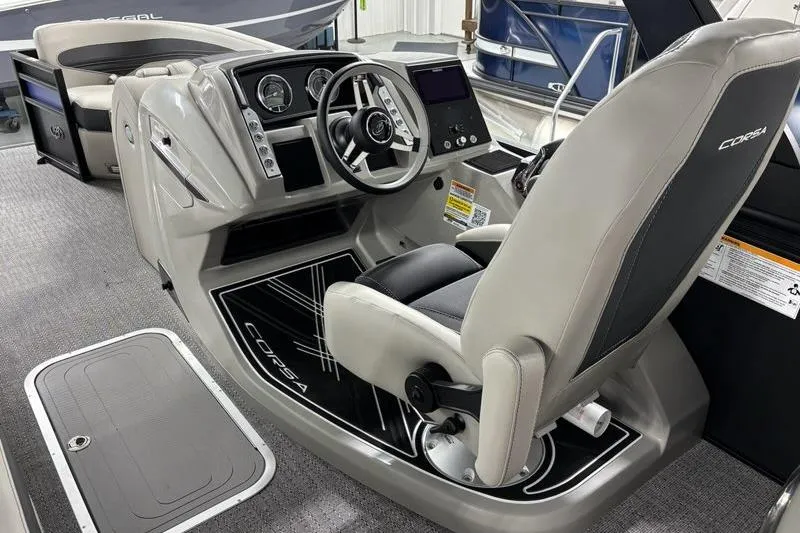 Slide: The Image of 2026 Barletta Corsa boat interior with modern dashboard and comfortable seating. - 6