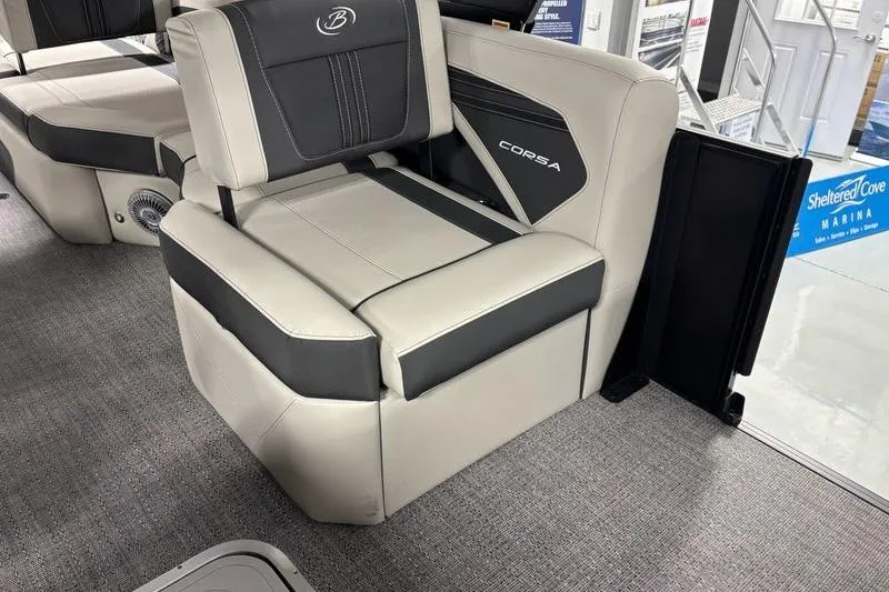 Slide: The Image of 2026 Barletta Corsa boat seat with sleek black and beige design. - 8