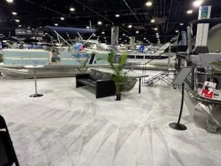 Slide: The Image of Boat show featuring 2023 South Bay 25Sport RS9 DC 3.0+ models on display. - 14