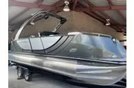 Slide: The Image of 2023 South Bay 25Sport RS9 DC 3.0+ pontoon boat in a showroom. - 4