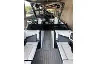 Slide: The Image of 2023 South Bay 25Sport RS9 DC 3.0+ boat interior with modern seating and sleek design. - 5