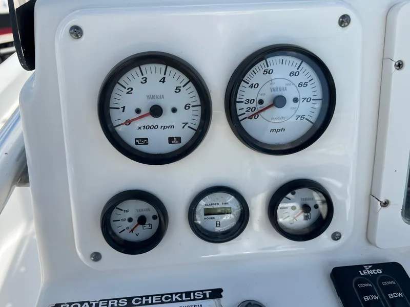 Slide: The Image of Dashboard of a 2011 NauticStar 2200 Tournament boat with Yamaha gauges. - 16