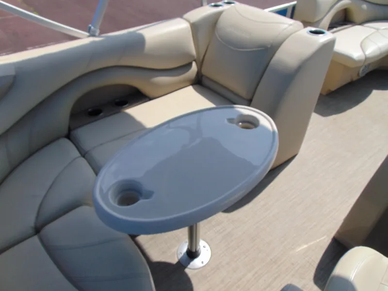 Slide: The Image of Luxurious seating and table on 2019 Sylvan Mirage 820 Cruise pontoon boat. - 13
