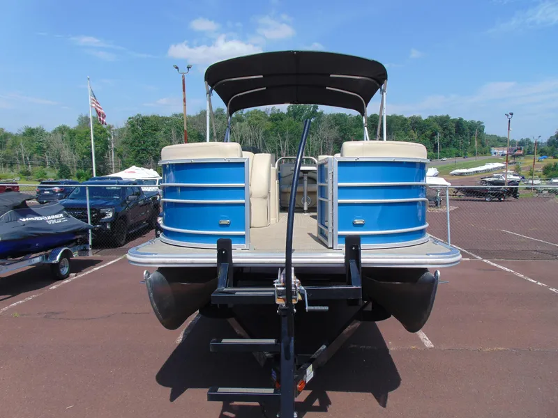 Slide: The Image of 2019 Sylvan Mirage 820 Cruise pontoon boat on trailer, parked outdoors. - 3