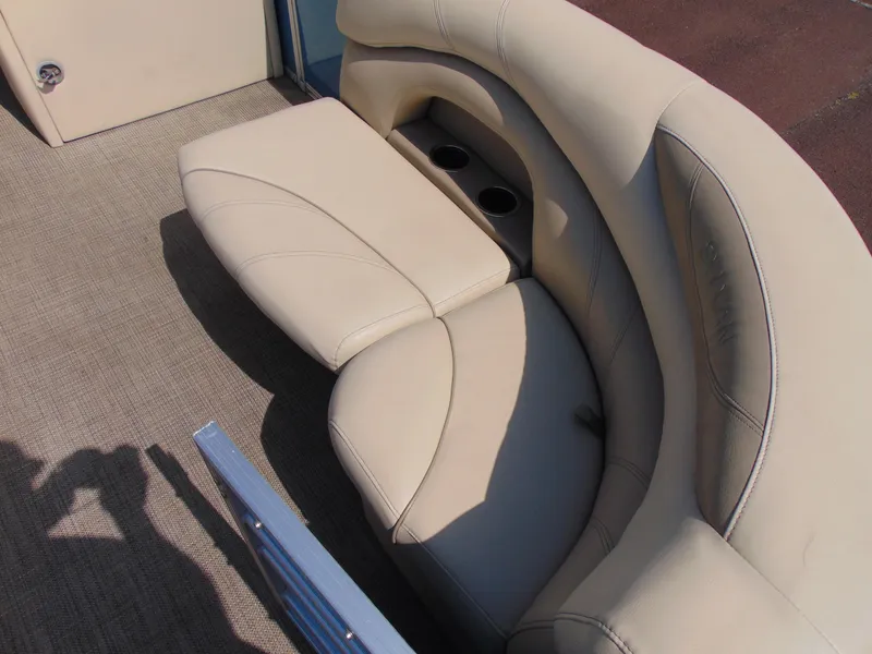 Slide: The Image of Luxurious beige seating on 2019 Sylvan Mirage 820 Cruise boat with cup holders. - 7
