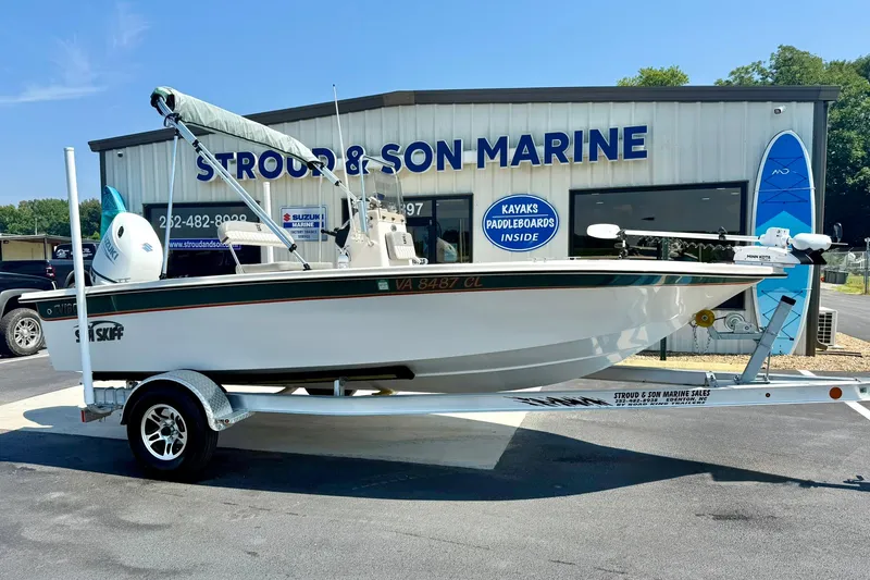 Slide: The Image of 2025 Carolina Skiff EV180 Sea Skiff on trailer at Stroud & Son Marine dealership. - 4