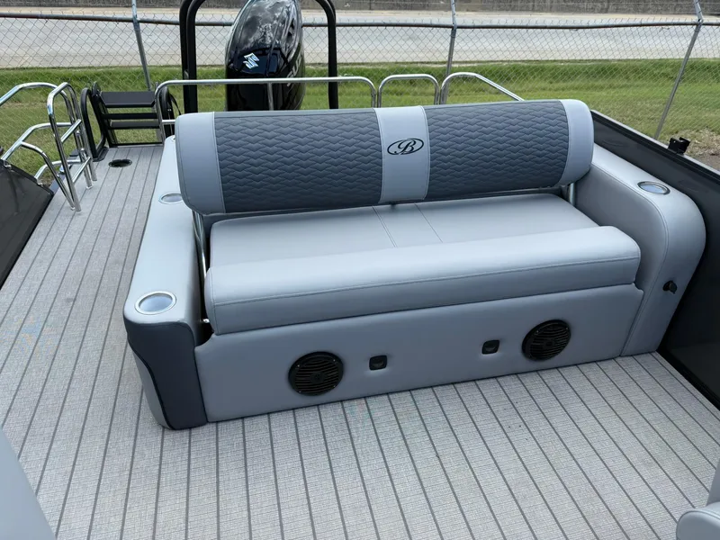 Slide: The Image of 2026 Bentley Pontoons Elite 253 Swingback with luxurious seating and modern design. - 12