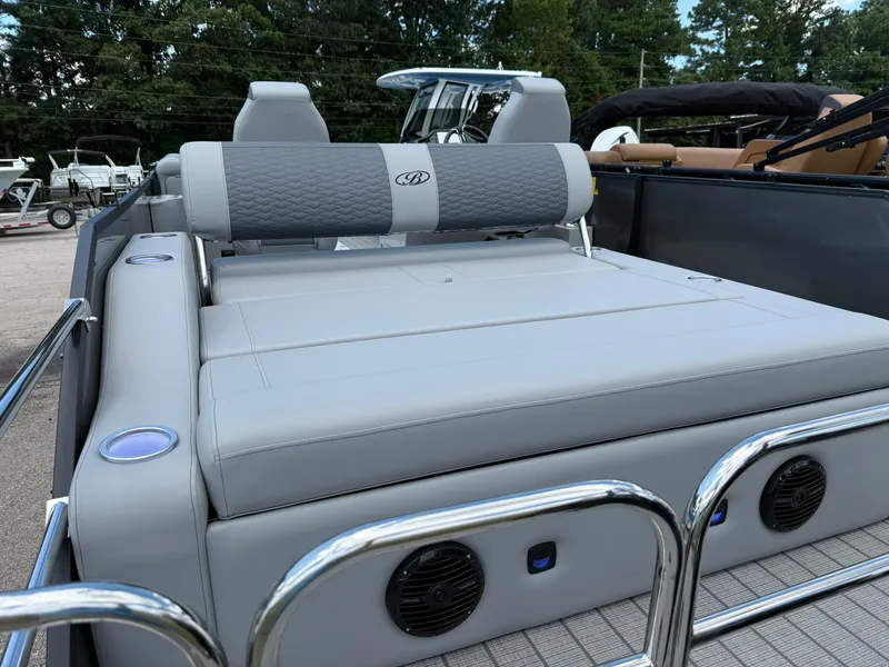 Slide: The Image of 2026 Bentley Pontoons Elite 253 Swingback with luxurious seating and modern design. - 14