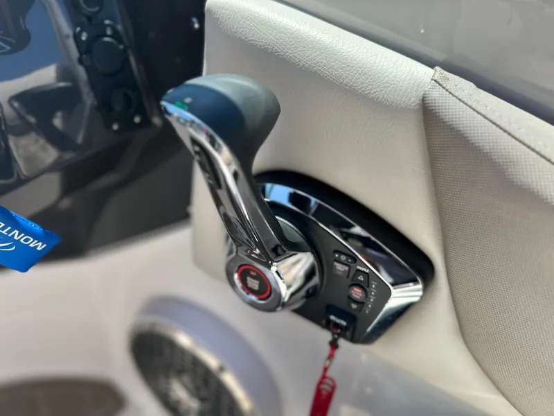 Slide: The Image of 2024 Monterey M-65 boat throttle control with sleek design and ergonomic handle. - 11