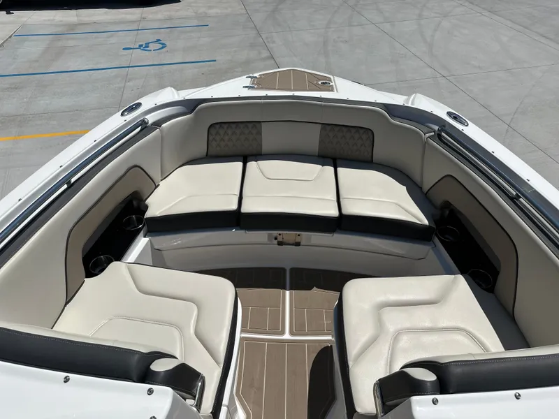 Slide: The Image of 2024 Monterey M-65 boat interior with luxurious seating and modern design. - 5