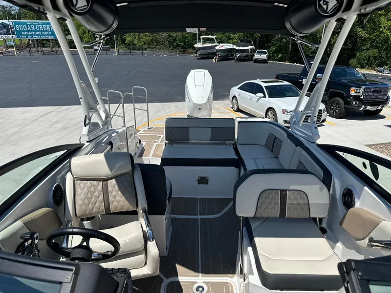 Slide: The Image of 2024 Monterey M-65 boat interior with luxurious seating and modern design. - 6