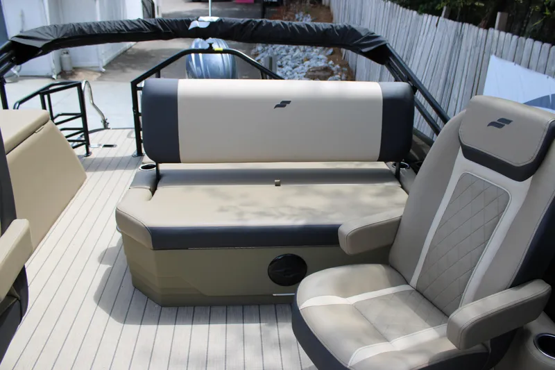 Slide: The Image of 2026 Starcraft EXS 1 Q DH boat interior with beige and gray seating. - 11
