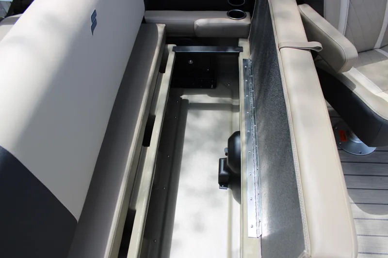 Slide: The Image of Interior view of 2026 Starcraft EXS 1 Q DH boat seating and storage compartment. - 12
