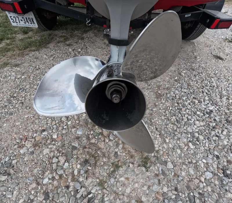Slide: The Image of Propeller of a 2016 Nitro Z20 boat on gravel surface. - 18