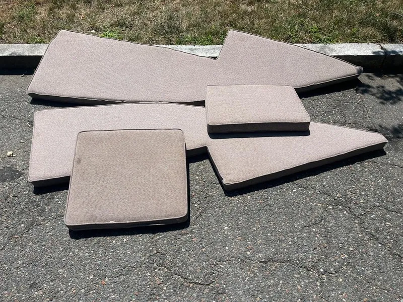 Slide: The Image of Cushions from a 1989 Mako 210 WA boat, laid out on pavement. - 38