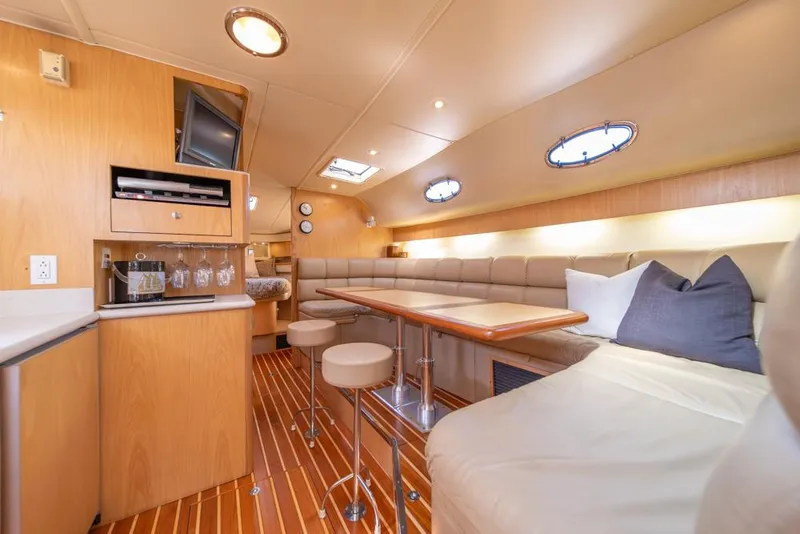 Slide: The Image of Luxurious interior of 2001 Tiara Sport 4000 EXPRESS yacht with modern amenities and seating. - 10