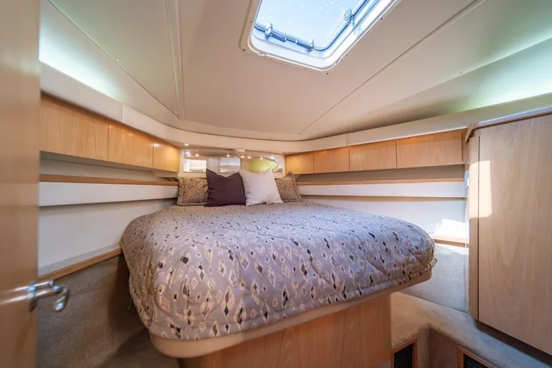 Slide: The Image of Luxurious cabin interior of 2001 Tiara Sport 4000 EXPRESS yacht with cozy bedding. - 17