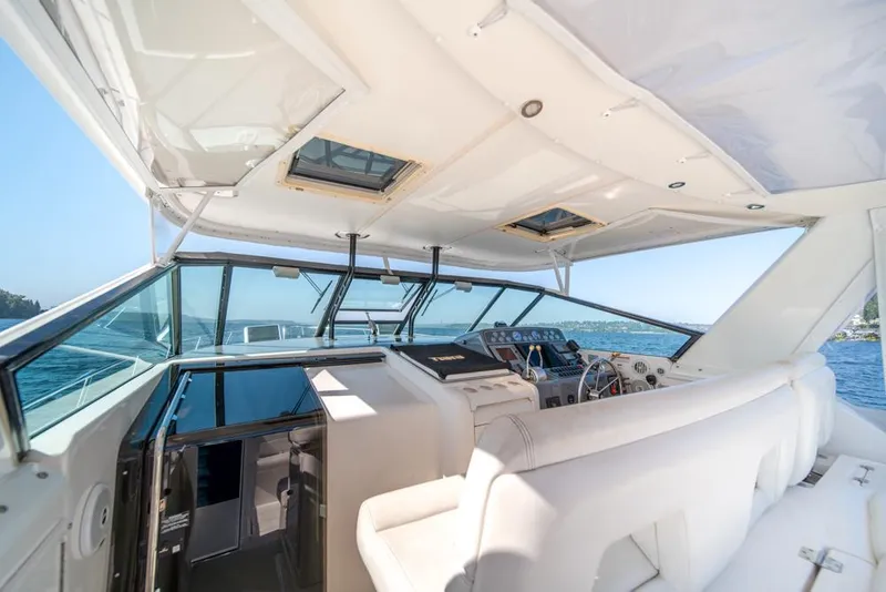 Slide: The Image of Interior view of 2001 Tiara Sport 4000 EXPRESS yacht cockpit with white seating. - 33