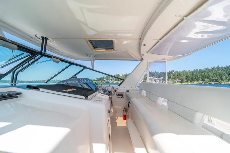 Slide: The Image of Interior view of 2001 Tiara Sport 4000 EXPRESS yacht with scenic water backdrop. - 37