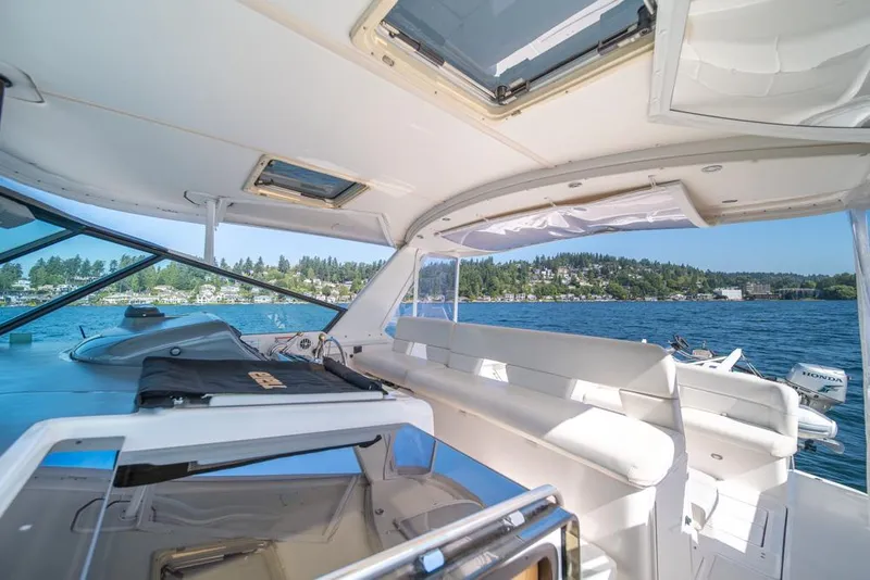 Slide: The Image of 2001 Tiara Sport 4000 EXPRESS yacht interior with scenic lake view. - 38