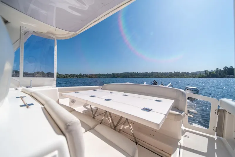 Slide: The Image of 2001 Tiara Sport 4000 EXPRESS yacht interior with lake view and seating area. - 39