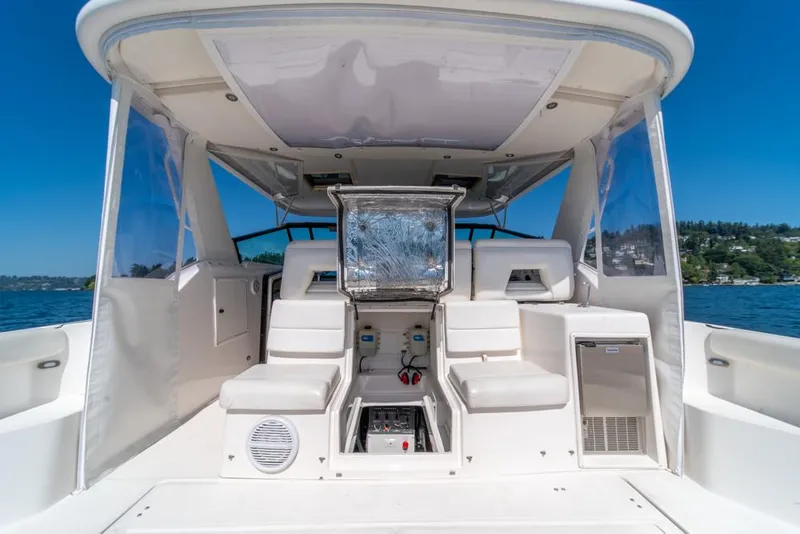 Slide: The Image of 2001 Tiara Sport 4000 EXPRESS boat interior with seating, open water view. - 42