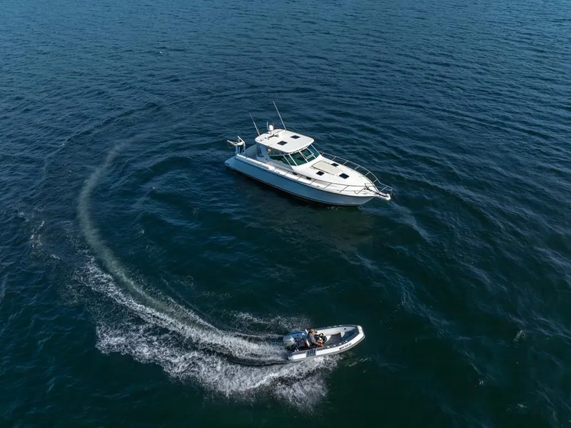 Slide: The Image of Aerial view of 2001 Tiara Sport 4000 EXPRESS yacht on open water. - 7