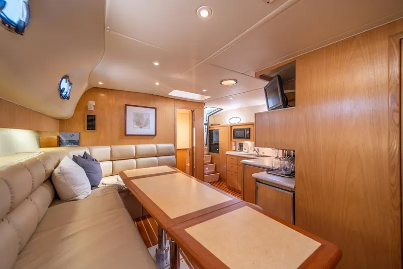 Slide: The Image of Luxurious interior of 2001 Tiara Sport 4000 EXPRESS yacht with modern amenities and cozy seating. - 9
