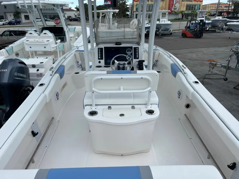 Slide: The Image of 2023 Robalo R222 Center Console boat with spacious deck and modern controls. - 5