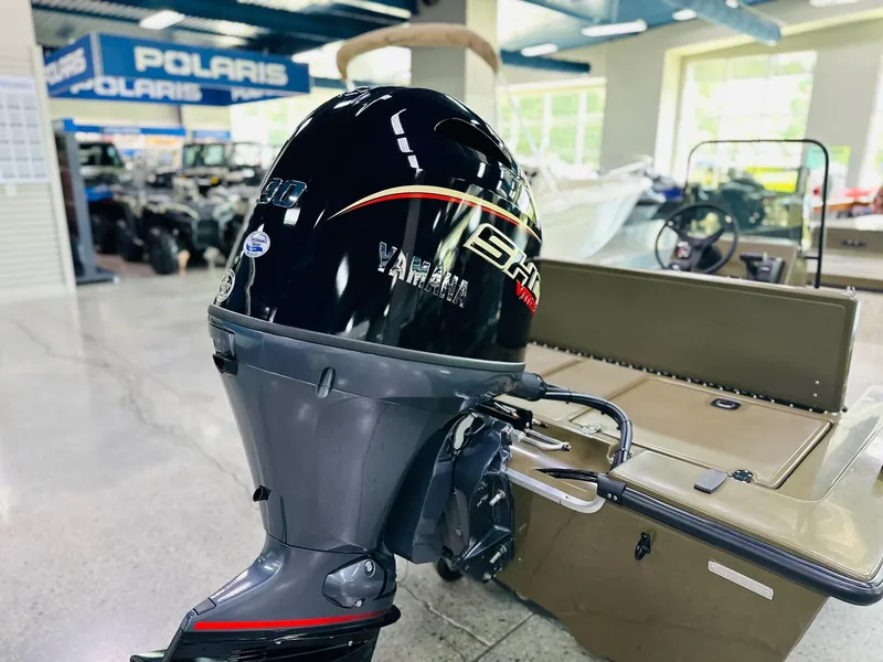 Slide: The Image of 2026 Mi Tide 1602 CC boat with Yamaha outboard motor in showroom. - 6